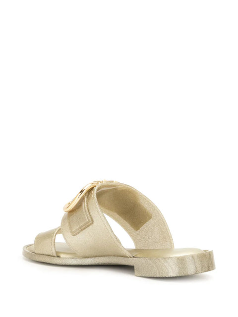 Ferragamo Gancini Metallic Flat Sandals in Gold